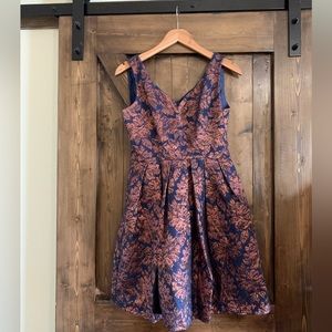 Retro 50s inspired metallic bronze and navy dress dress